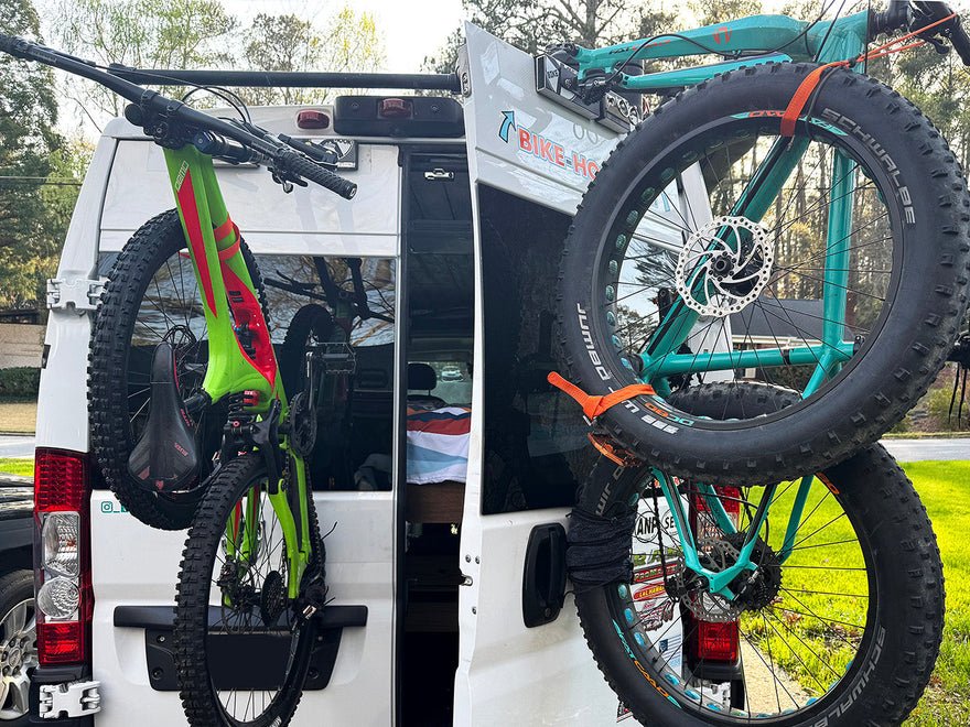 van rear door loaded with bikes on a bike-hook easy load rack