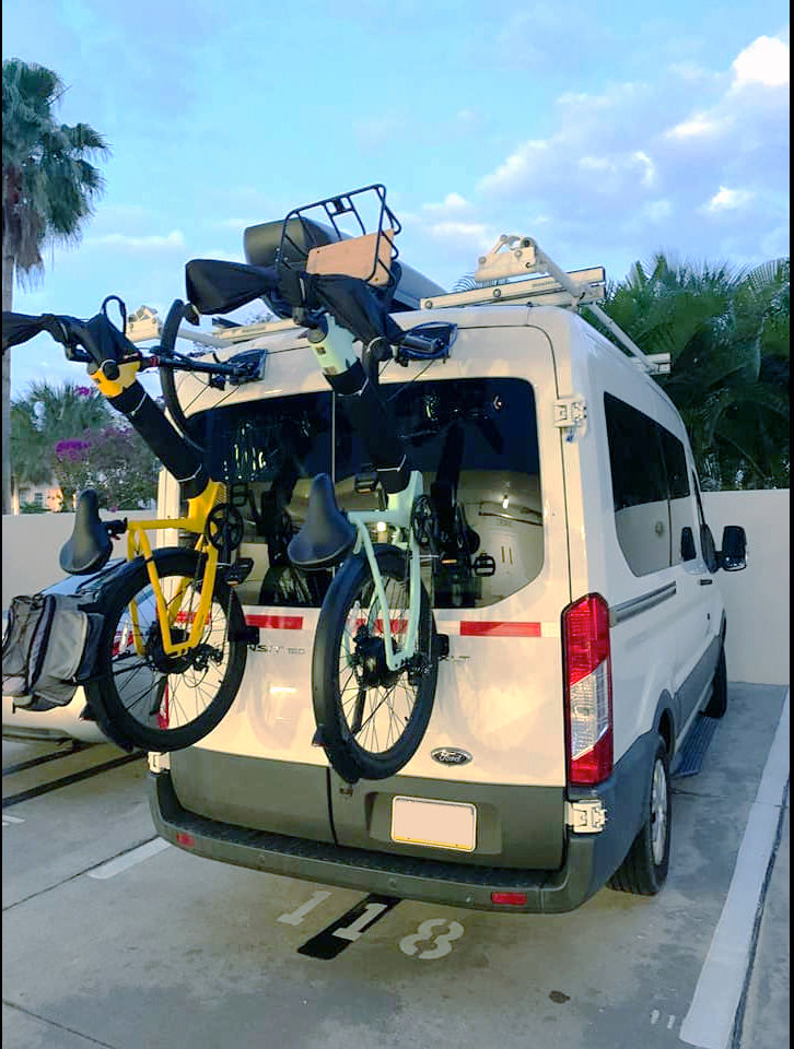 Rear view of Ford Transit van with Bike-Hook fork-mount bike rack attached.