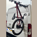 Peugeot Boxer campervan equipped with Bike-Hook fork-mount bike rack for easy bike transport.

