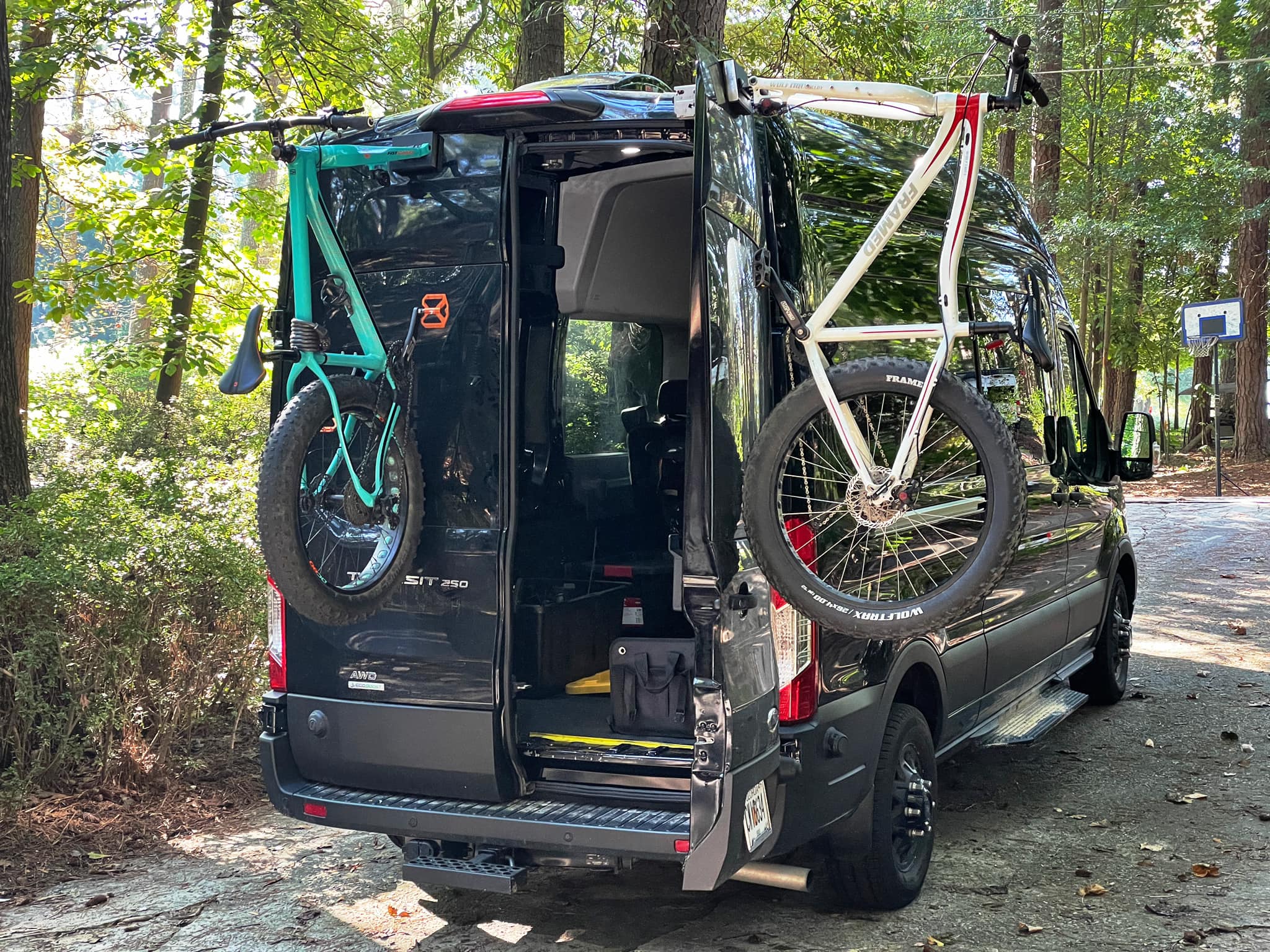 Bike-Hook fork-mount bike rack installed on Ford Transit, perfect for campervans.