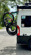Bike-Hook bike carrier for RAM Promaster installs directly to rear doors. Perfect for compact camper builds and vans with limited space. Fork mount works with road, MTB, gravel, and e-bikes. Hitch-free and ultra lightweight at under 3 lbs.