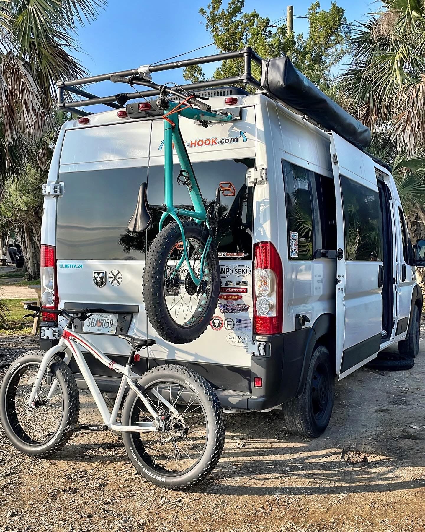 No-drill vertical bike rack system for RAM Promaster. Mounts on rear doors with fork mount for secure, space-saving bike transport. Holds 1–4 bikes, including e-bikes and fat tire bikes. Lightweight, modular, and perfect for campervans or vanlife builds.