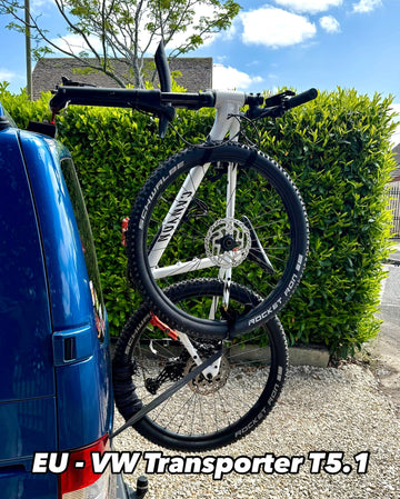 Two bicycles mounted on a VW Transporter T6 using Bike-Hooks, showcasing easy access to rear doors and lightweight fork mount system.