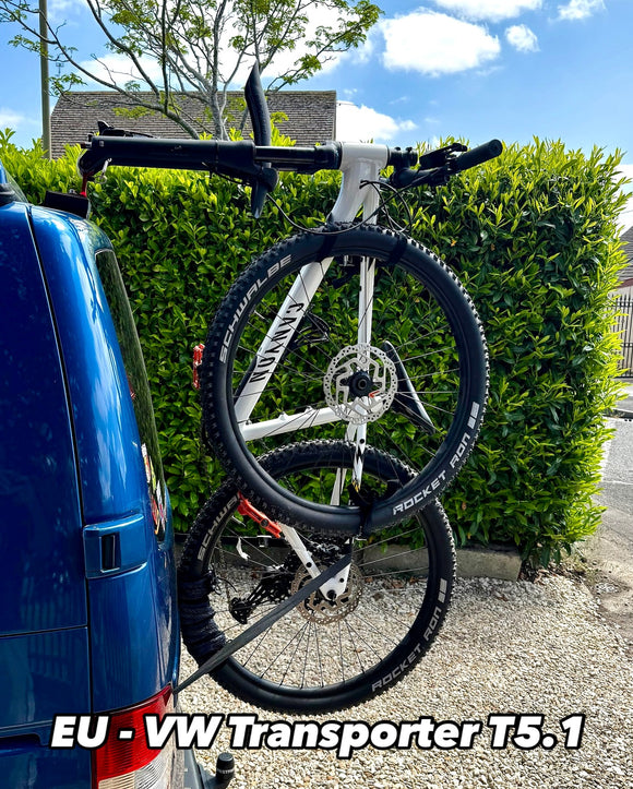 Two bicycles mounted on a VW Transporter T6 using Bike-Hooks, showcasing easy access to rear doors and lightweight fork mount system.